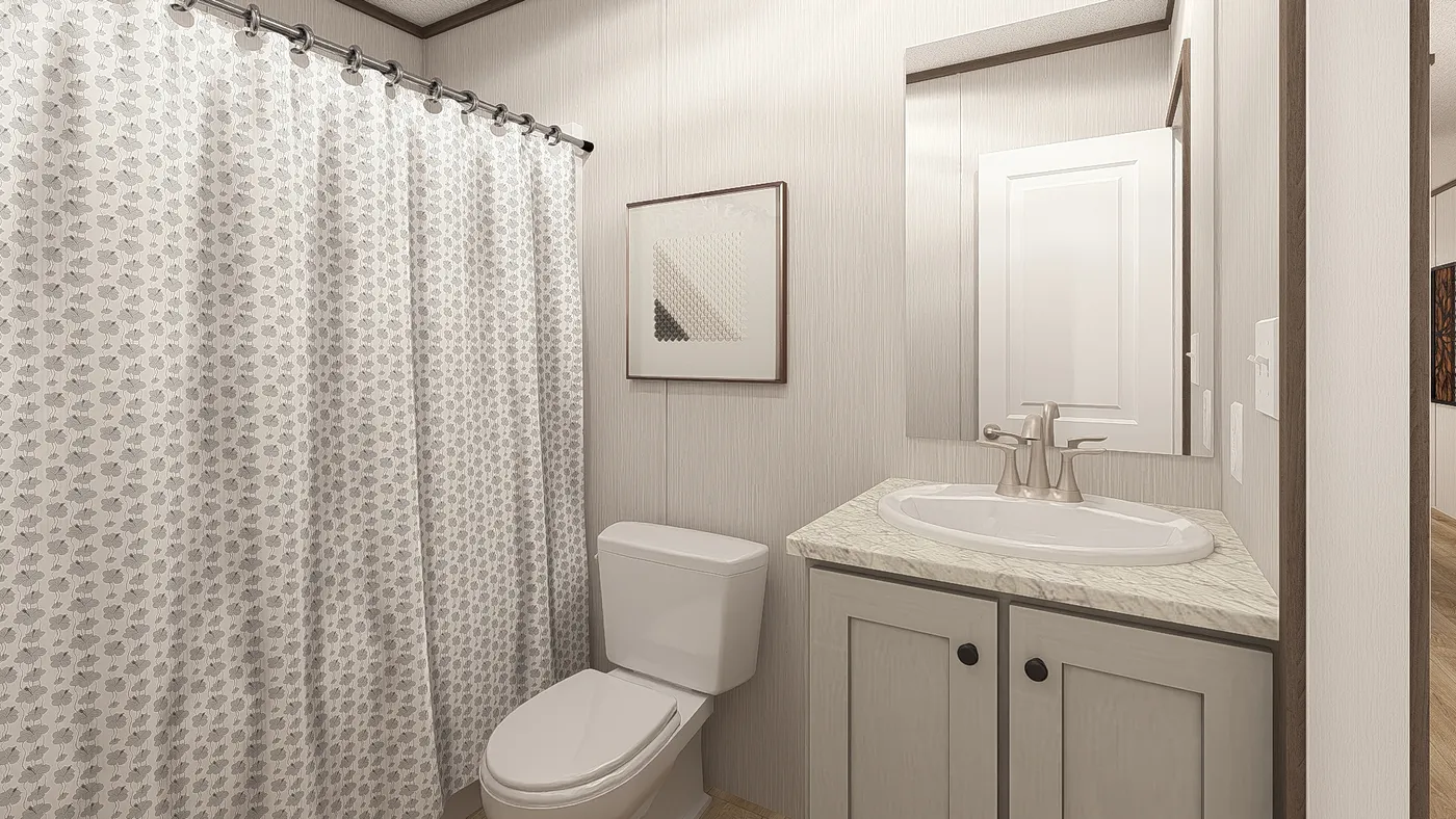 The LEGEND 16X72 COASTAL BREEZE I Guest Bathroom. This Manufactured Mobile Home features 3 bedrooms and 2 baths.
