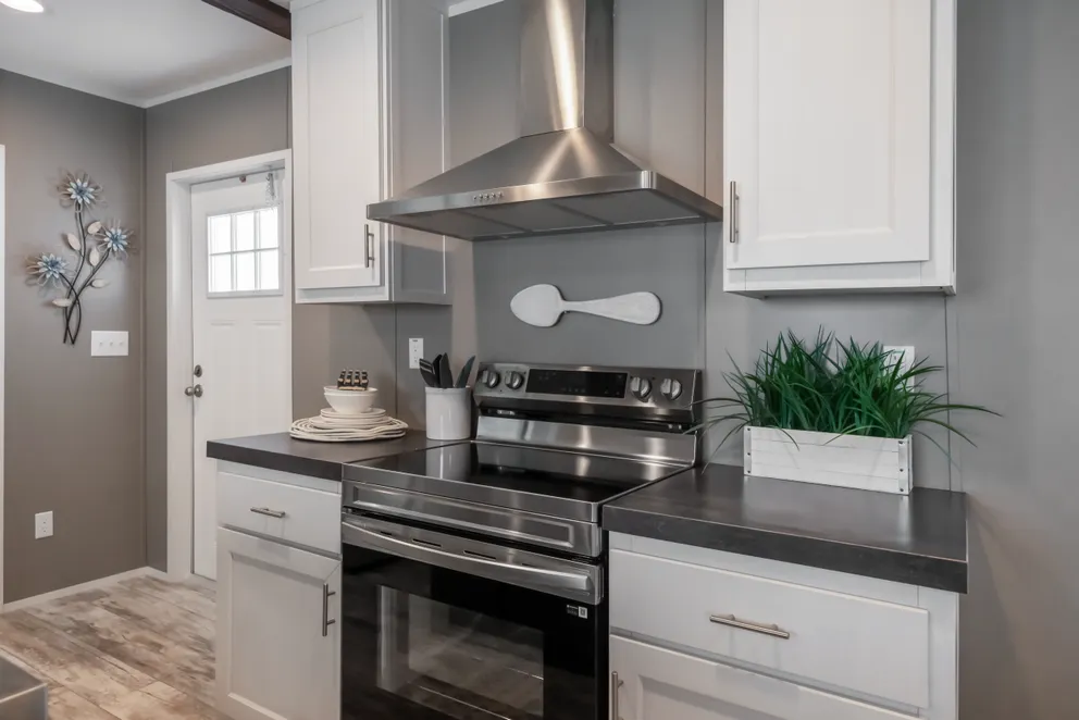 The LIBERTY Kitchen. This Manufactured Mobile Home features 3 bedrooms and 2 baths.