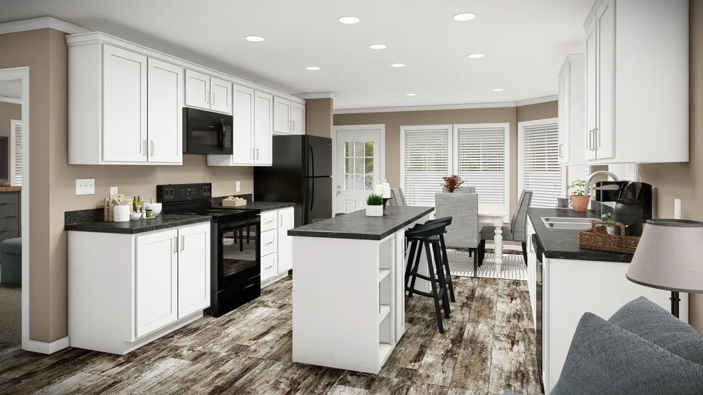 The THE MAVERICK Kitchen. This Manufactured Mobile Home features 3 bedrooms and 2 baths.