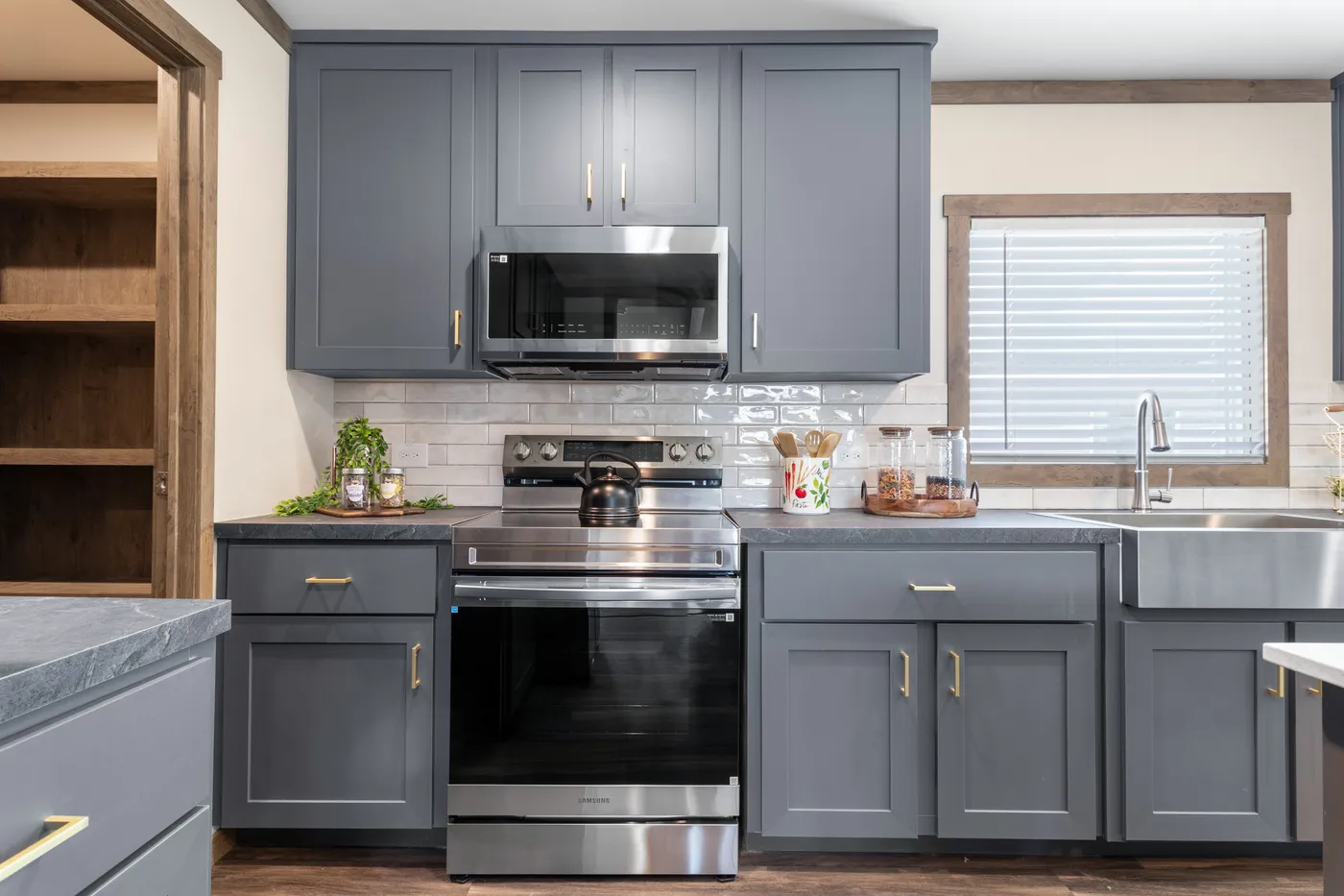 The FARM 4 FLEX Kitchen. This Manufactured Mobile Home features 4 bedrooms and 3 baths.