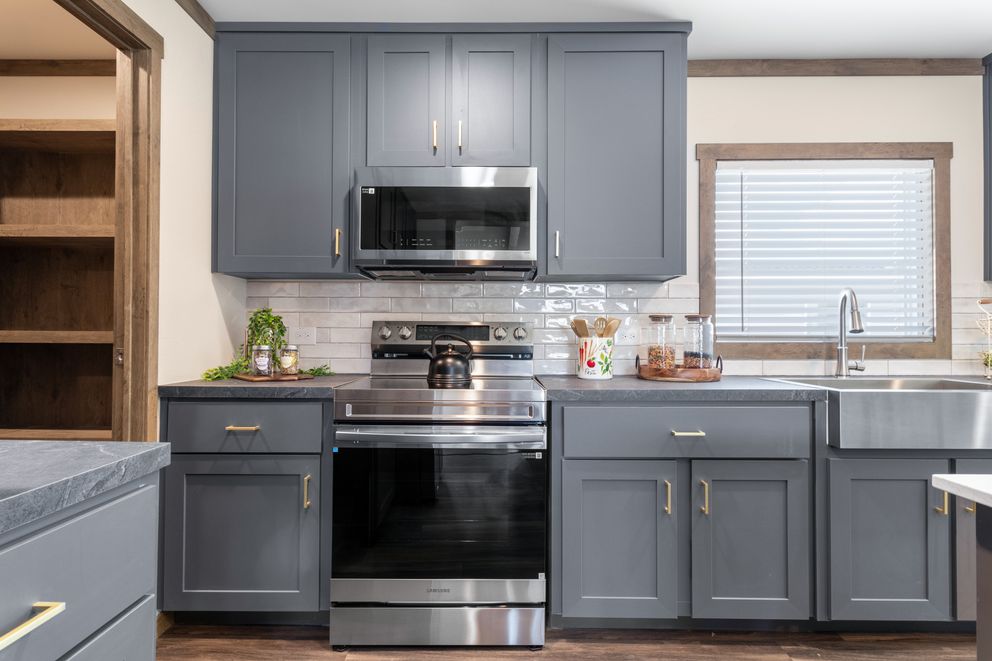 The FARM 4 FLEX Kitchen. This Manufactured Mobile Home features 4 bedrooms and 3 baths.
