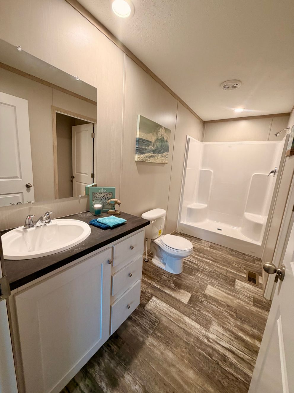 The HANCOCK Primary Bathroom. This Manufactured Mobile Home features 4 bedrooms and 2 baths.