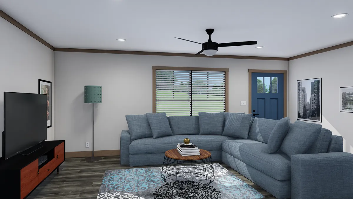 The NELLIE Living Room. This Manufactured Mobile Home features 4 bedrooms and 2 baths.