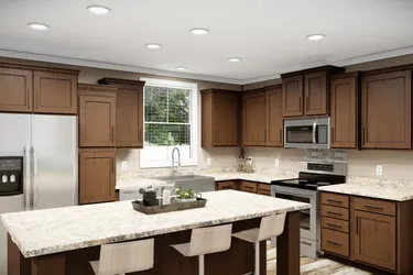 The THE LLOYD II Kitchen. This Manufactured Mobile Home features 3 bedrooms and 2 baths.