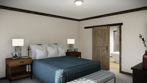 The THE ANDERSON II Primary Bedroom. This Manufactured Mobile Home features 3 bedrooms and 2 baths.