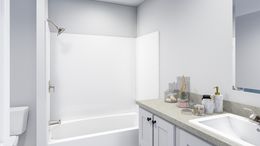The LET IT BE Guest Bathroom. This Manufactured Mobile Home features 3 bedrooms and 2 baths.