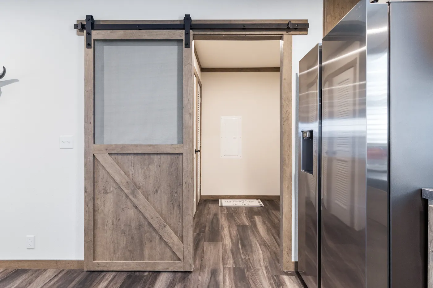 The ISABELLA ELITE Utility Room. This Manufactured Mobile Home features 3 bedrooms and 2 baths.