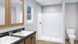 The SUPERFLY Primary Bathroom. This Modular Home features 5 bedrooms and 2 baths.
