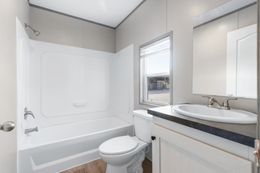 The ANNIVERSARY 16682A Guest Bathroom. This Manufactured Mobile Home features 2 bedrooms and 2 baths.