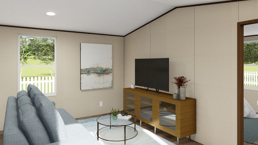 The BLISS Living Room. This Manufactured Mobile Home features 2 bedrooms and 1 bath.