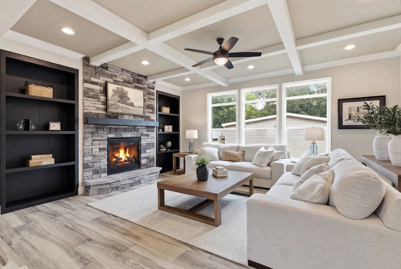 The THE SUMMIT Living Room. This Manufactured Mobile Home features 3 bedrooms and 2 baths.