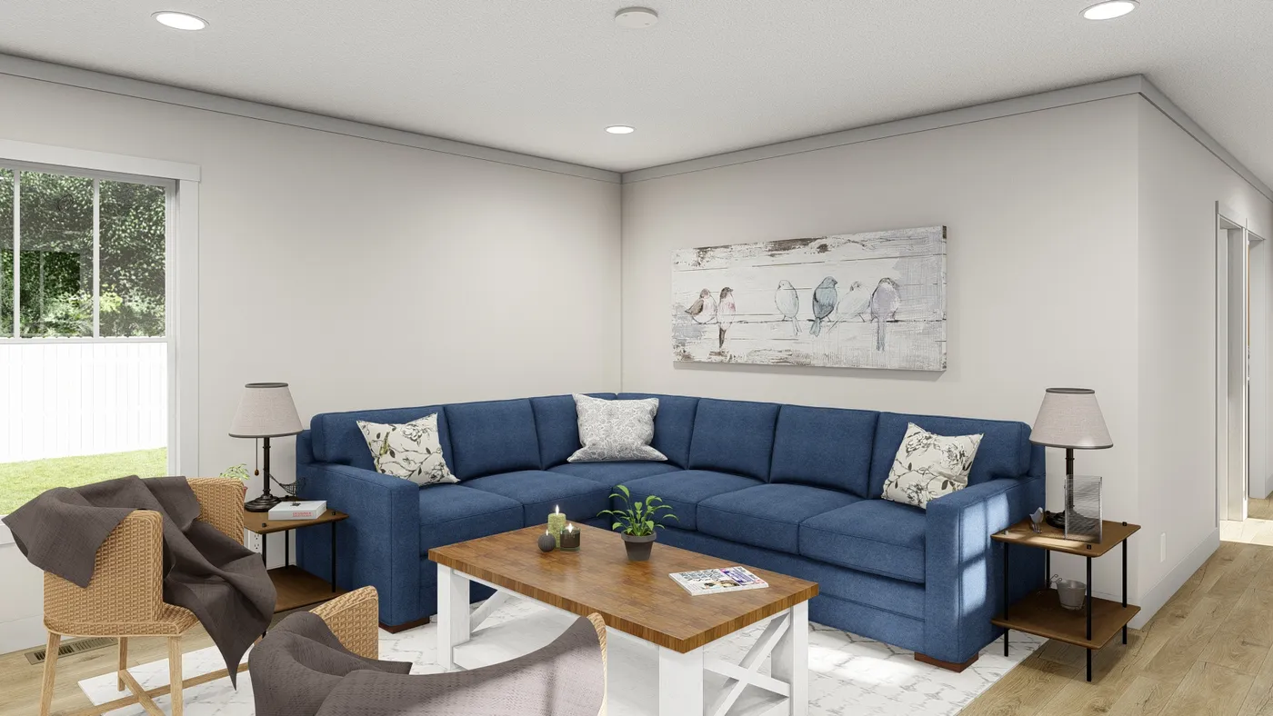 The MOVE ON UP Living Room. This Manufactured Mobile Home features 3 bedrooms and 2 baths.