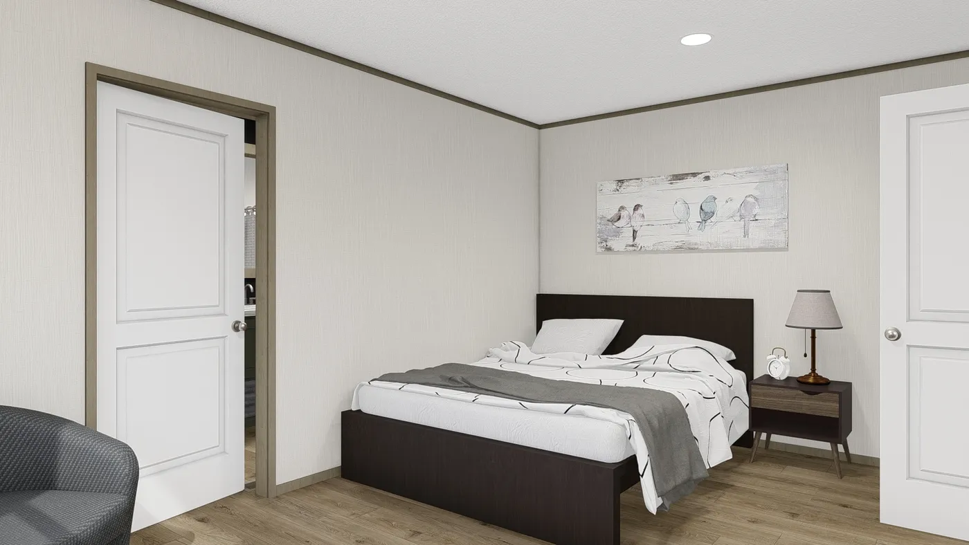 The HUDSON Primary Bedroom. This Manufactured Mobile Home features 3 bedrooms and 2 baths.