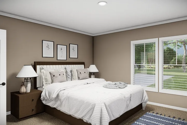 The THE LLOYD II Primary Bedroom. This Manufactured Mobile Home features 3 bedrooms and 2 baths.