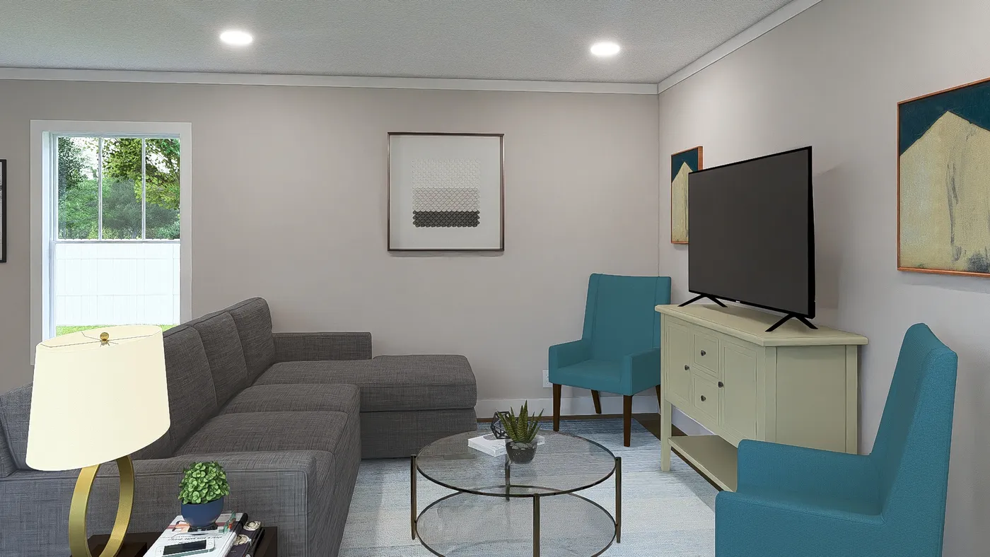 The BORN TO RUN Living Room. This Manufactured Mobile Home features 2 bedrooms and 2 baths.
