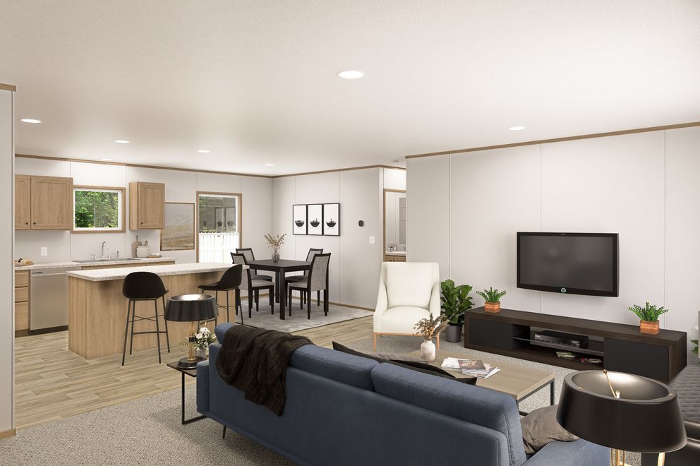 The THE EAGLE 52 Living Room. This Manufactured Mobile Home features 3 bedrooms and 2 baths.