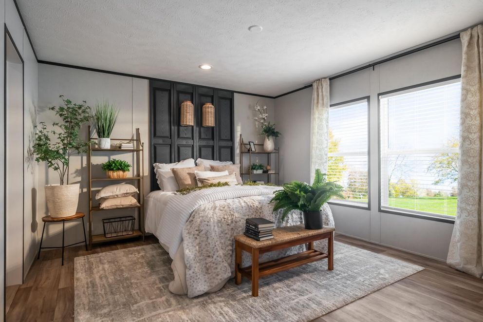 The ELEMENT Primary Bedroom. This Manufactured Mobile Home features 3 bedrooms and 2 baths.