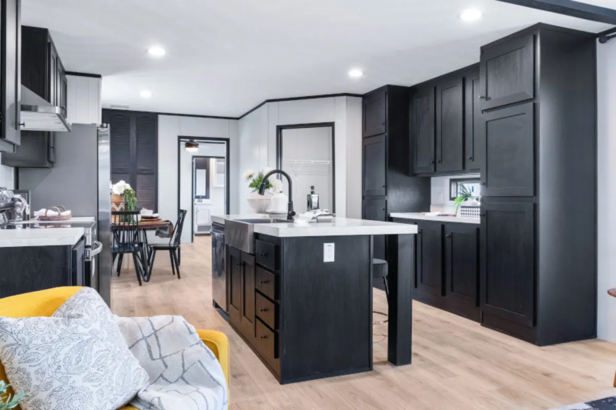 The ANNIVERSARY 16763S Kitchen. This Manufactured Mobile Home features 3 bedrooms and 2 baths.