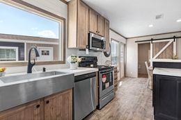 The CRAZY EIGHTS Kitchen. This Manufactured Mobile Home features 4 bedrooms and 2 baths.