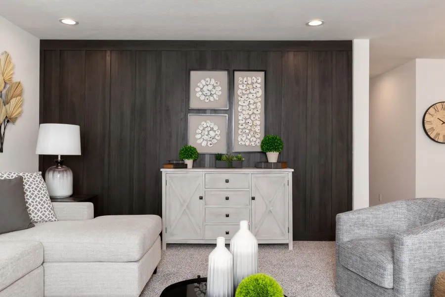 The BUTLER PLACE/6428-MS056 SECT Living Room. This Manufactured Mobile Home features 3 bedrooms and 3 baths.