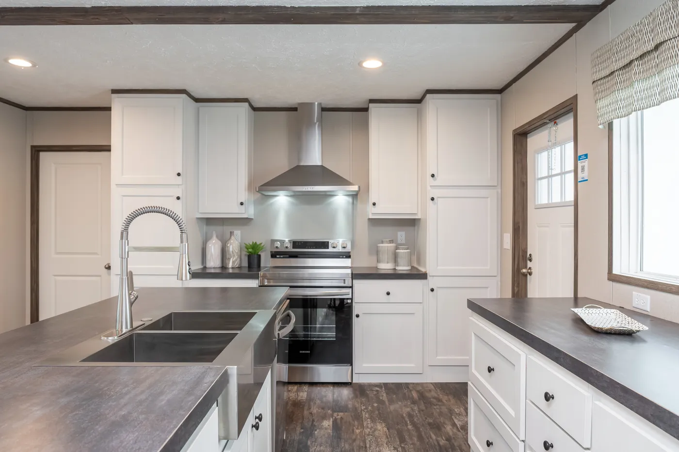 The THE GENERAL Kitchen. This Manufactured Mobile Home features 3 bedrooms and 2 baths.