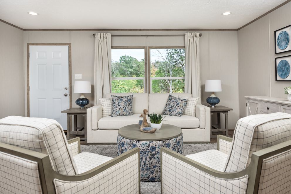 The ASPIRE Living Room. This Manufactured Mobile Home features 3 bedrooms and 2 baths.