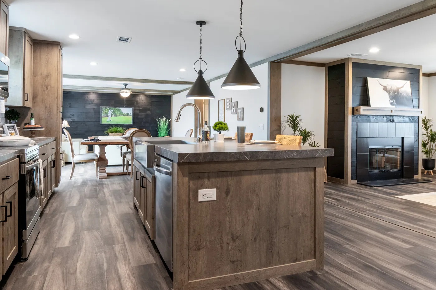 The ISABELLA ELITE Living Room. This Manufactured Mobile Home features 3 bedrooms and 2 baths.