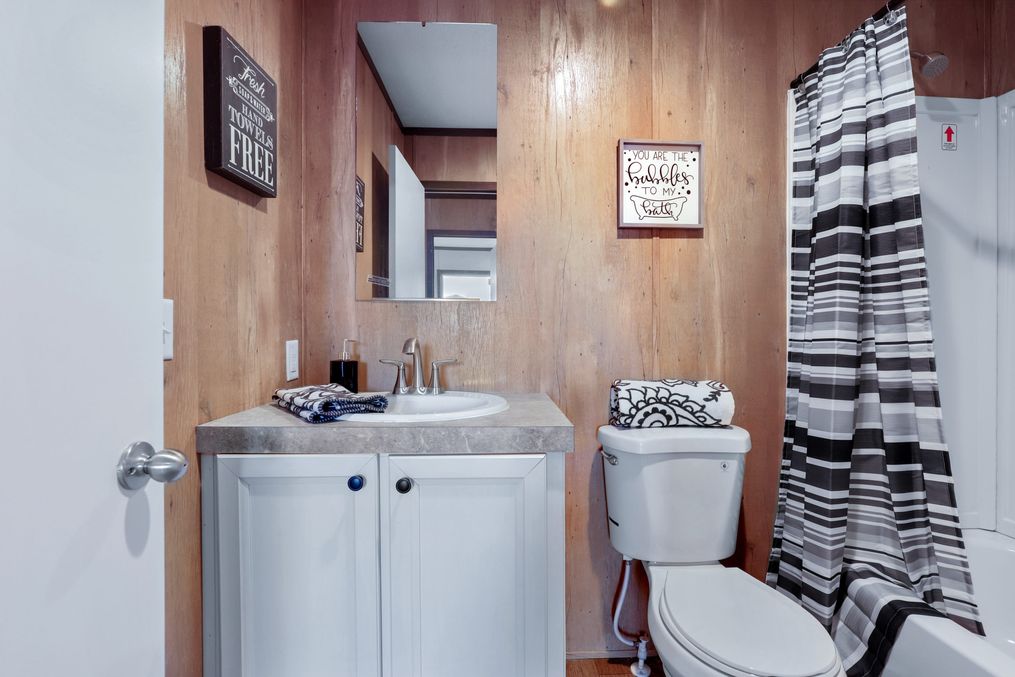 The VISION Guest Bathroom. This Manufactured Mobile Home features 3 bedrooms and 2 baths.