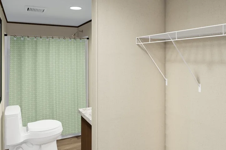 The DELIGHT Primary Bathroom. This Manufactured Mobile Home features 2 bedrooms and 2 baths.