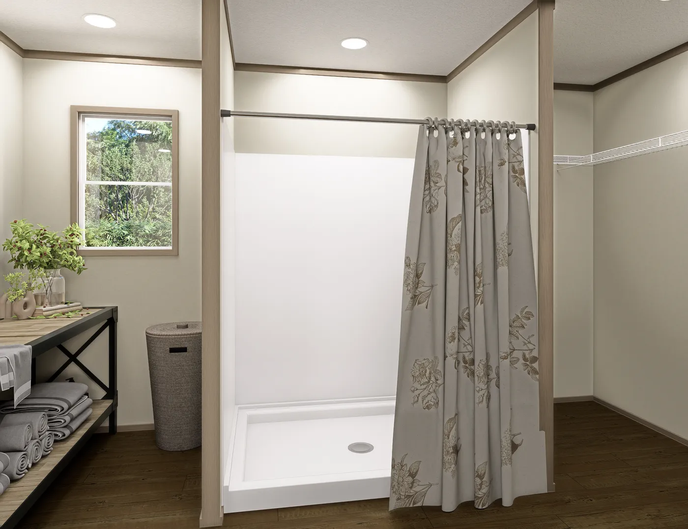 The RAINIER Primary Bedroom. This Manufactured Mobile Home features 4 bedrooms and 3 baths.