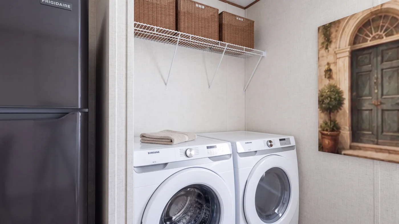 The ELM Utility Room. This Manufactured Mobile Home features 2 bedrooms and 1 bath.