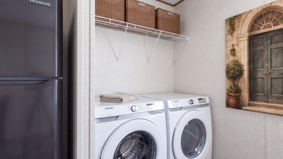 The ELM Utility Room. This Manufactured Mobile Home features 2 bedrooms and 1 bath.