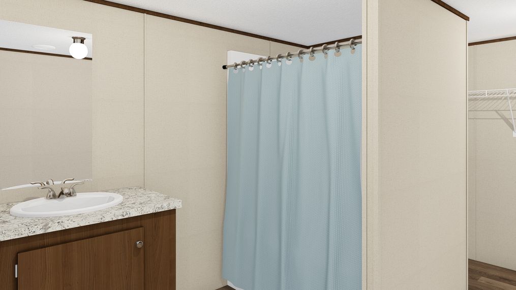 The EXCITEMENT Primary Bathroom. This Manufactured Mobile Home features 3 bedrooms and 2 baths.