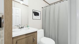 The TRIUMPH Guest Bathroom. This Manufactured Mobile Home features 5 bedrooms and 3 baths.