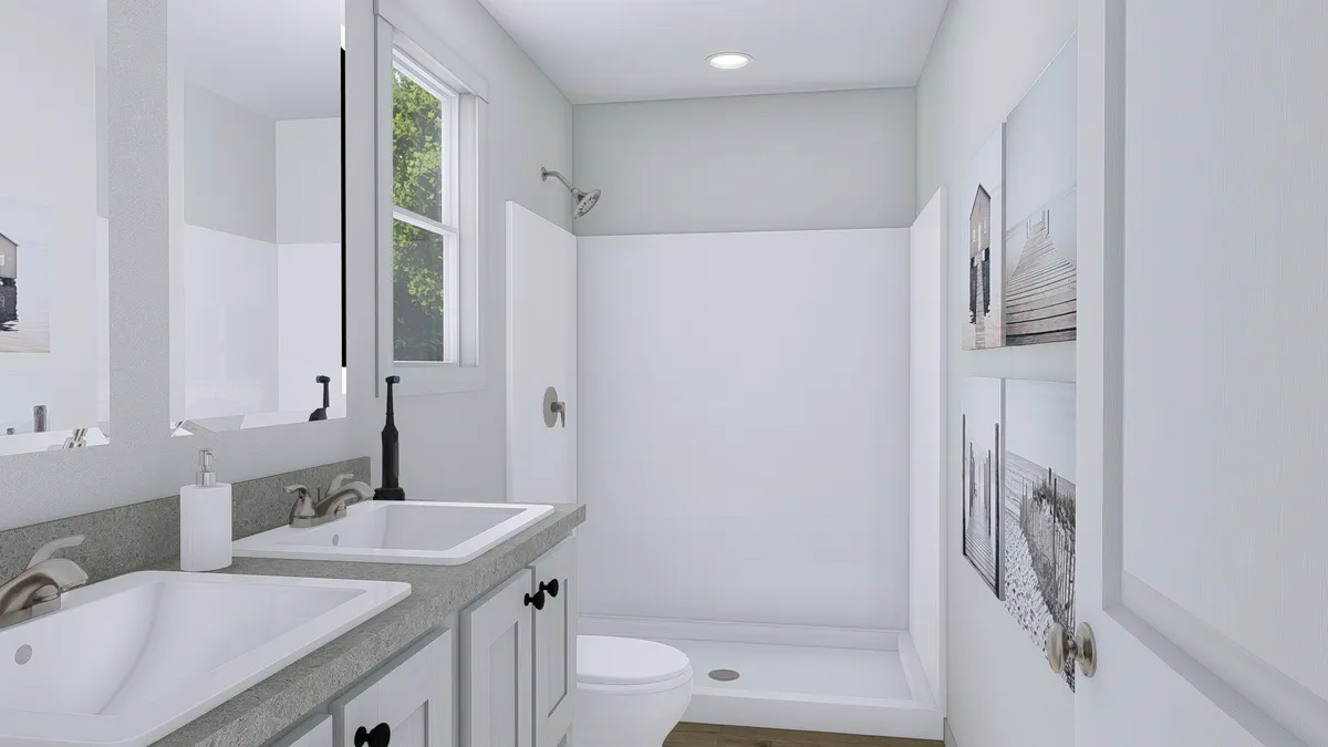 The PURPLE RAIN Primary Bathroom. This Manufactured Mobile Home features 3 bedrooms and 2 baths.