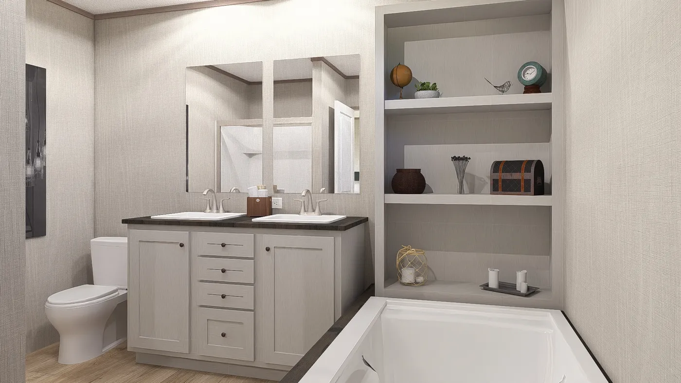 The ULTRA A-PLUS 16X76 Primary Bathroom. This Manufactured Mobile Home features 3 bedrooms and 2 baths.