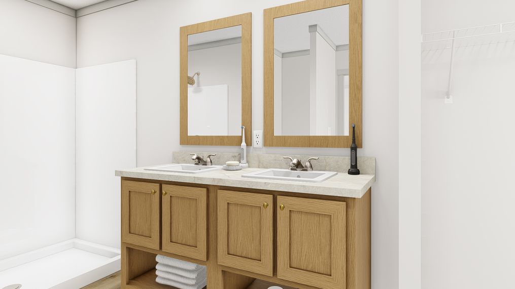 The SOLSBURY HILL Primary Bathroom. This Manufactured Mobile Home features 3 bedrooms and 2 baths.