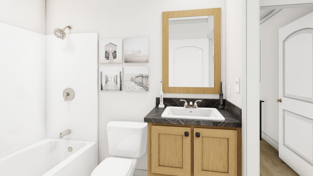 The SOLSBURY HILL Guest Bathroom. This Manufactured Mobile Home features 3 bedrooms and 2 baths.