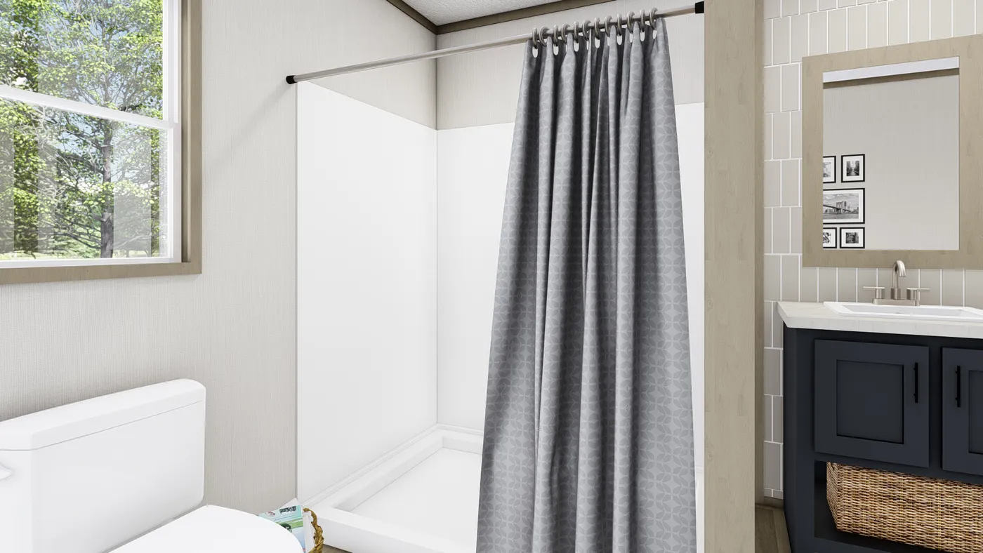The DRAKE Primary Bathroom. This Manufactured Mobile Home features 3 bedrooms and 2 baths.