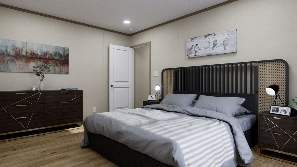 The 7216-CC03 HARBORVIEW 72 Primary Bedroom. This Manufactured Mobile Home features 3 bedrooms and 2 baths.