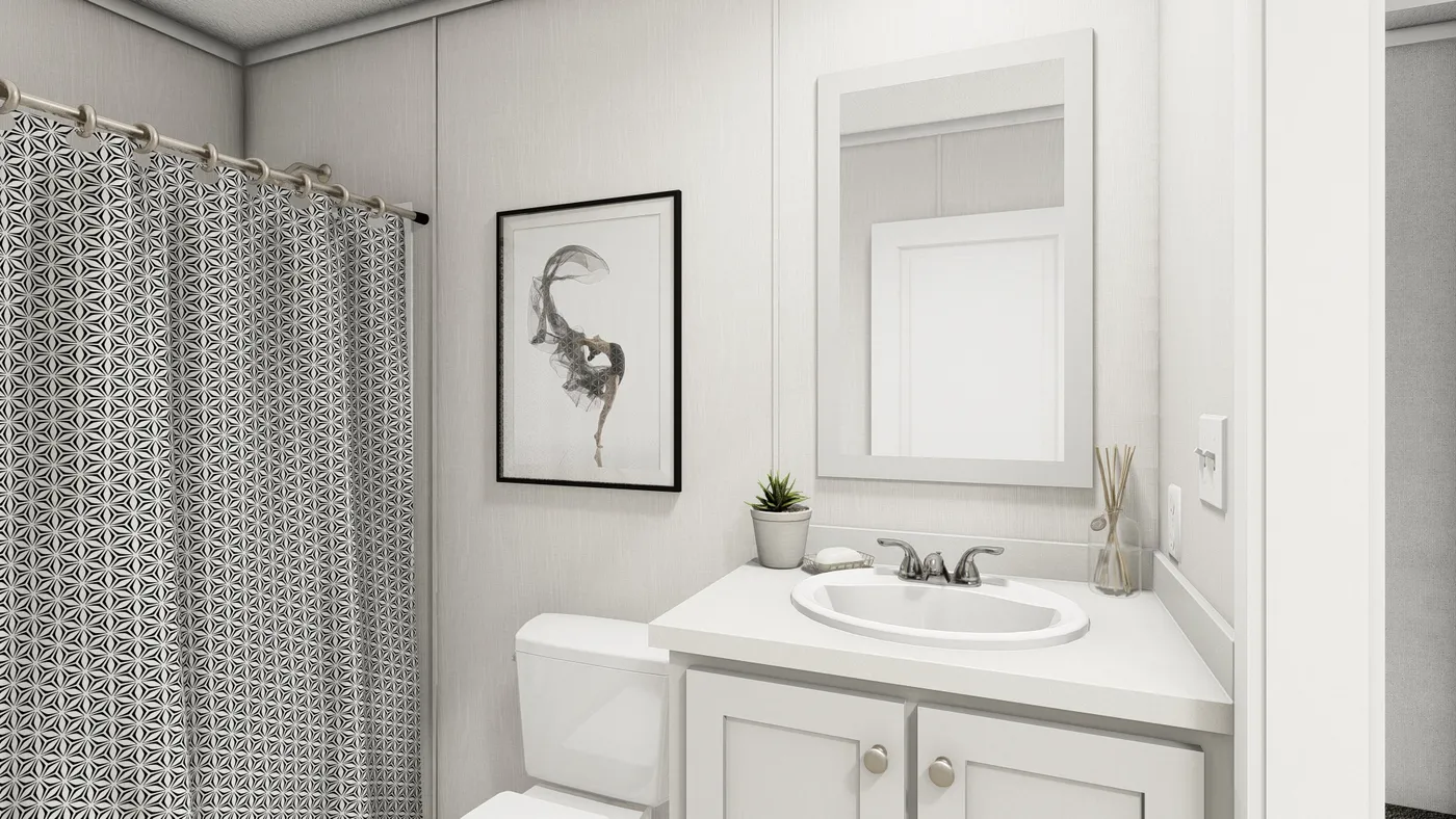 The ONYX Guest Bathroom. This Manufactured Mobile Home features 1 bedroom and 1 bath.