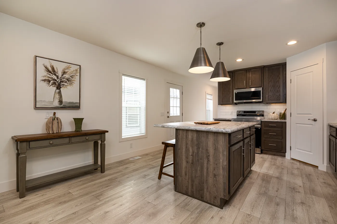 The RAMSEY 217-1 Kitchen. This Manufactured Mobile Home features 3 bedrooms and 2 baths.