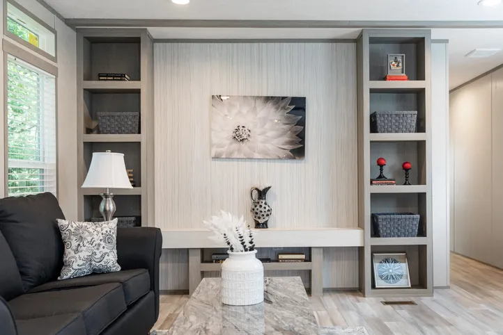 The THE ANNIVERSARY 76 Living Room. This Manufactured Mobile Home features 3 bedrooms and 2 baths.