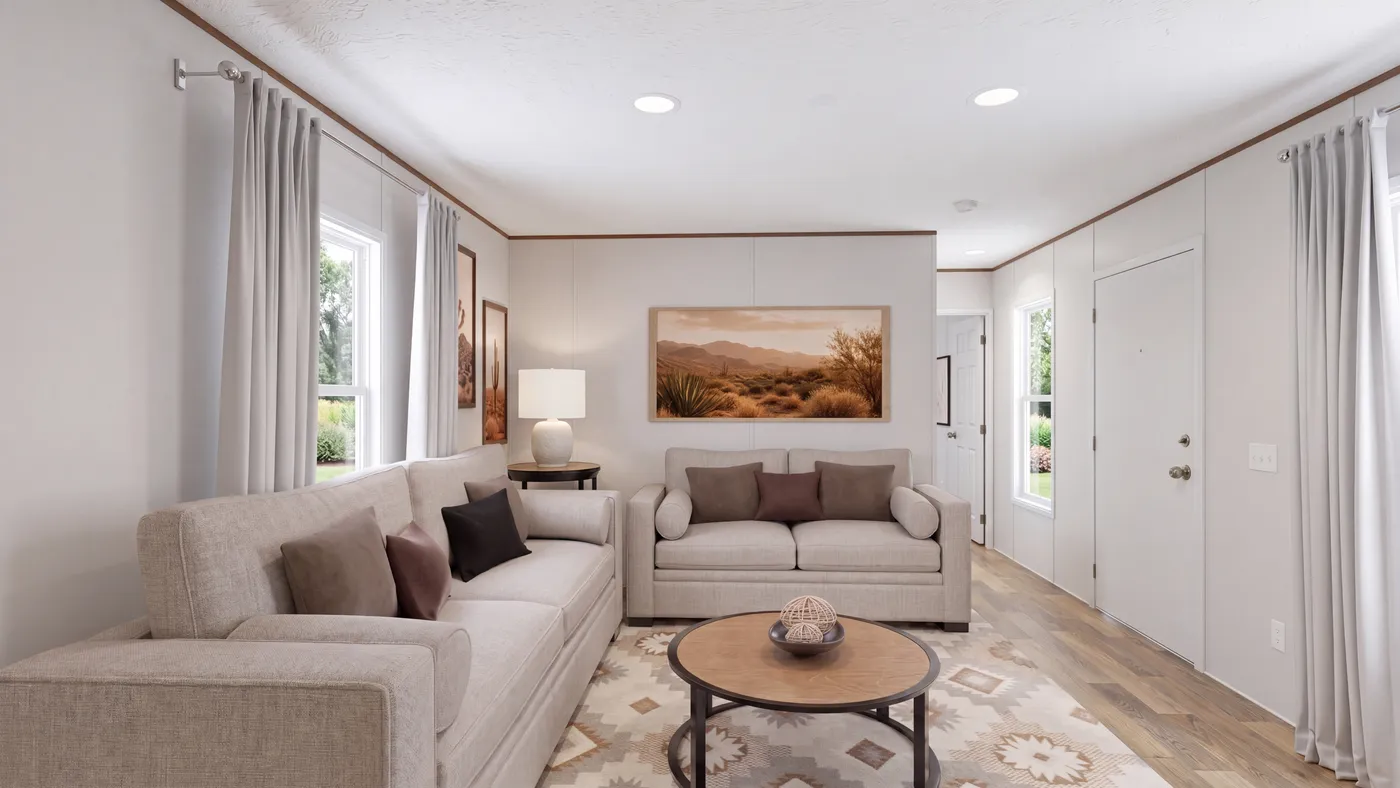 The DOGWOOD Living Room. This Manufactured Mobile Home features 2 bedrooms and 2 baths.