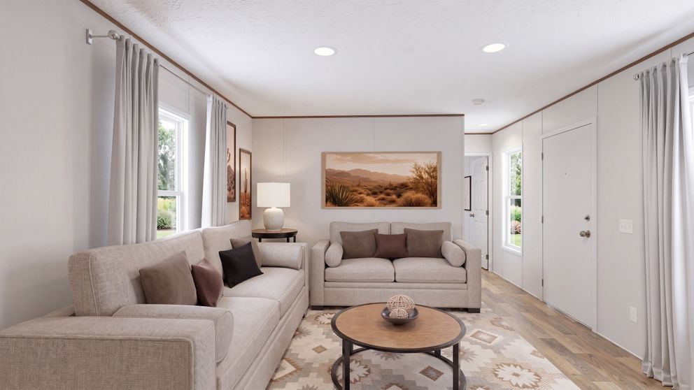The DOGWOOD Living Room. This Manufactured Mobile Home features 2 bedrooms and 2 baths.