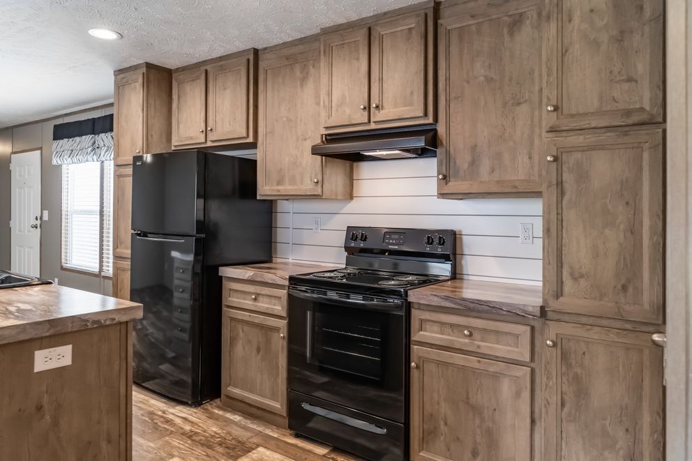 The PEYTON Exterior. This Manufactured Mobile Home features 3 bedrooms and 2 baths.