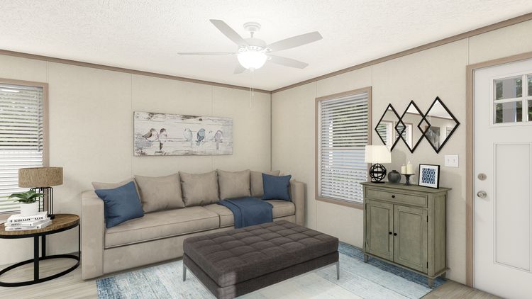 The 7616-4773P THE PULSE Living Room. This Manufactured Mobile Home features 3 bedrooms and 2 baths.