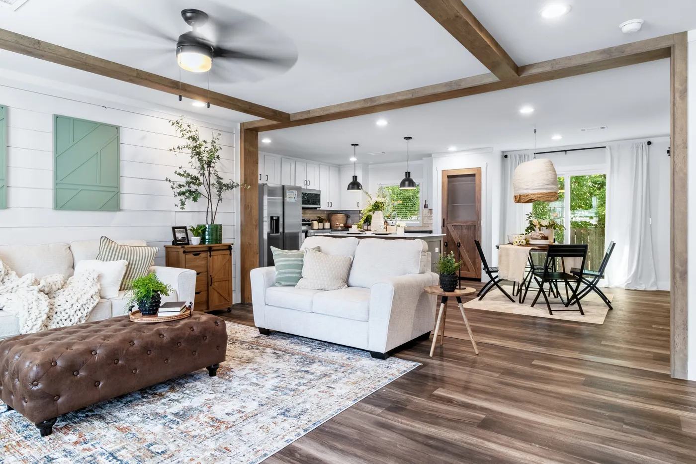 The SAWYER ELITE Living Room. This Manufactured Mobile Home features 3 bedrooms and 2 baths.