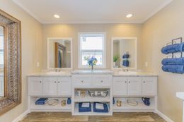 The SWEET BREEZE 72 Primary Bathroom. This Manufactured Mobile Home features 4 bedrooms and 2 baths.
