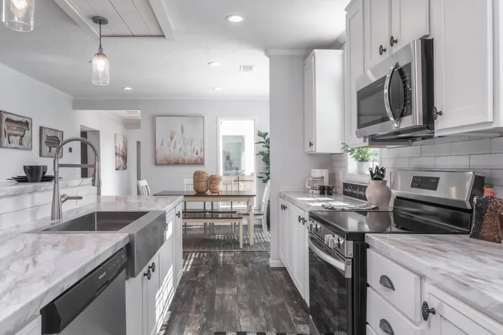The THE HEWITT Kitchen. This Manufactured Mobile Home features 4 bedrooms and 3 baths.